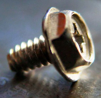 A cross-slot (Philips head) machine bolt